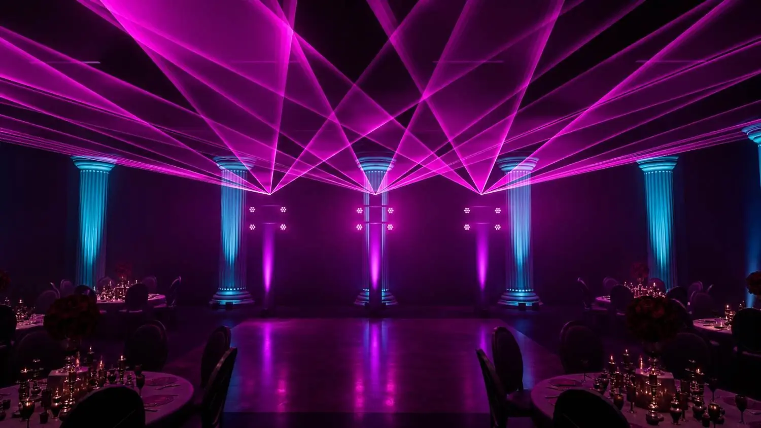 Pink laser show over a ballroom wedding reception